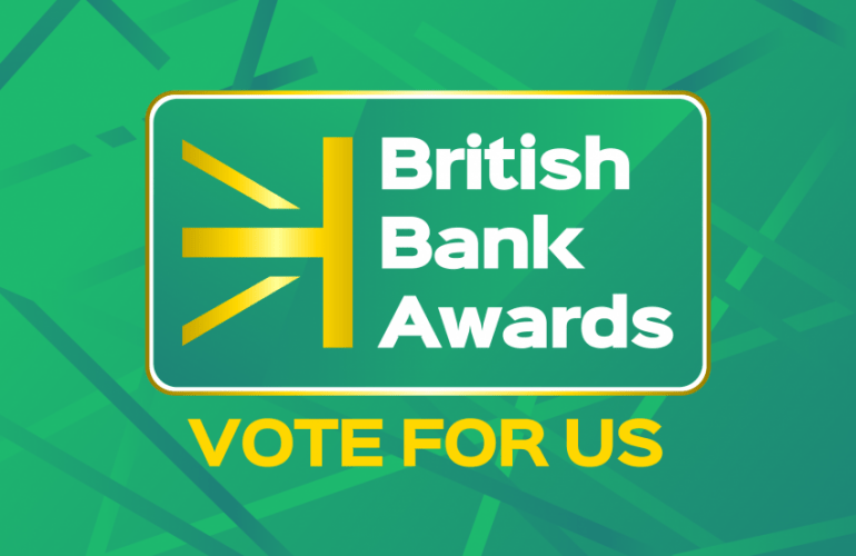 Graphic displaying “British Bank Awards” with a directional arrow icon and the text “Vote for us” on a green background.