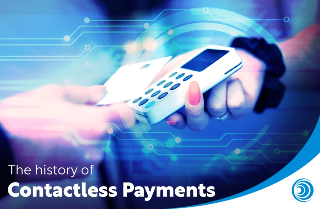 Person making a contactless card payment using a payment terminal, illustrating the evolution of contactless payments from physical cards to digital wallets.