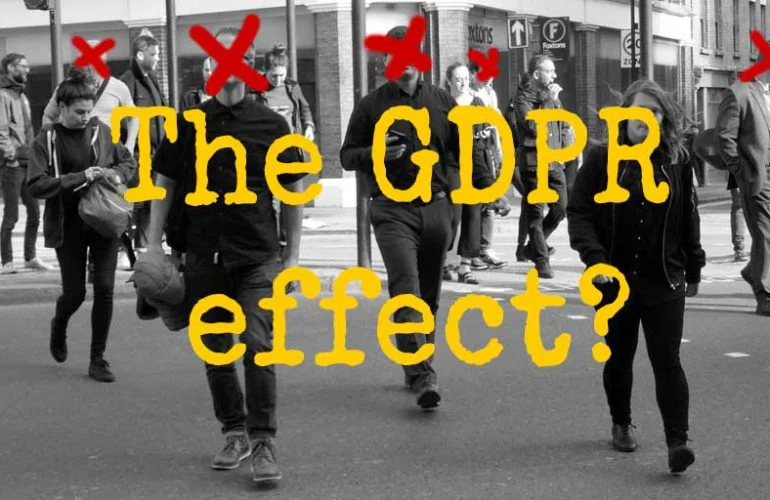 Black and white image of pedestrians crossing a street with red X marks over some individuals and text reading “The GDPR effect?”