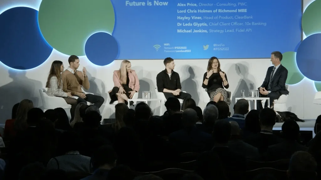 Panel discussion featuring fintech industry speakers at a fintech conference event discussing trends and innovation in financial technology.