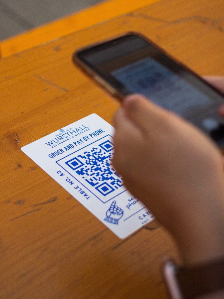 QR codes have a two-dimensional design which can be read ten times faster than bar codes.